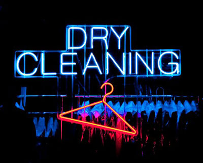 Neon "Dry Cleaning" sign with hanger.